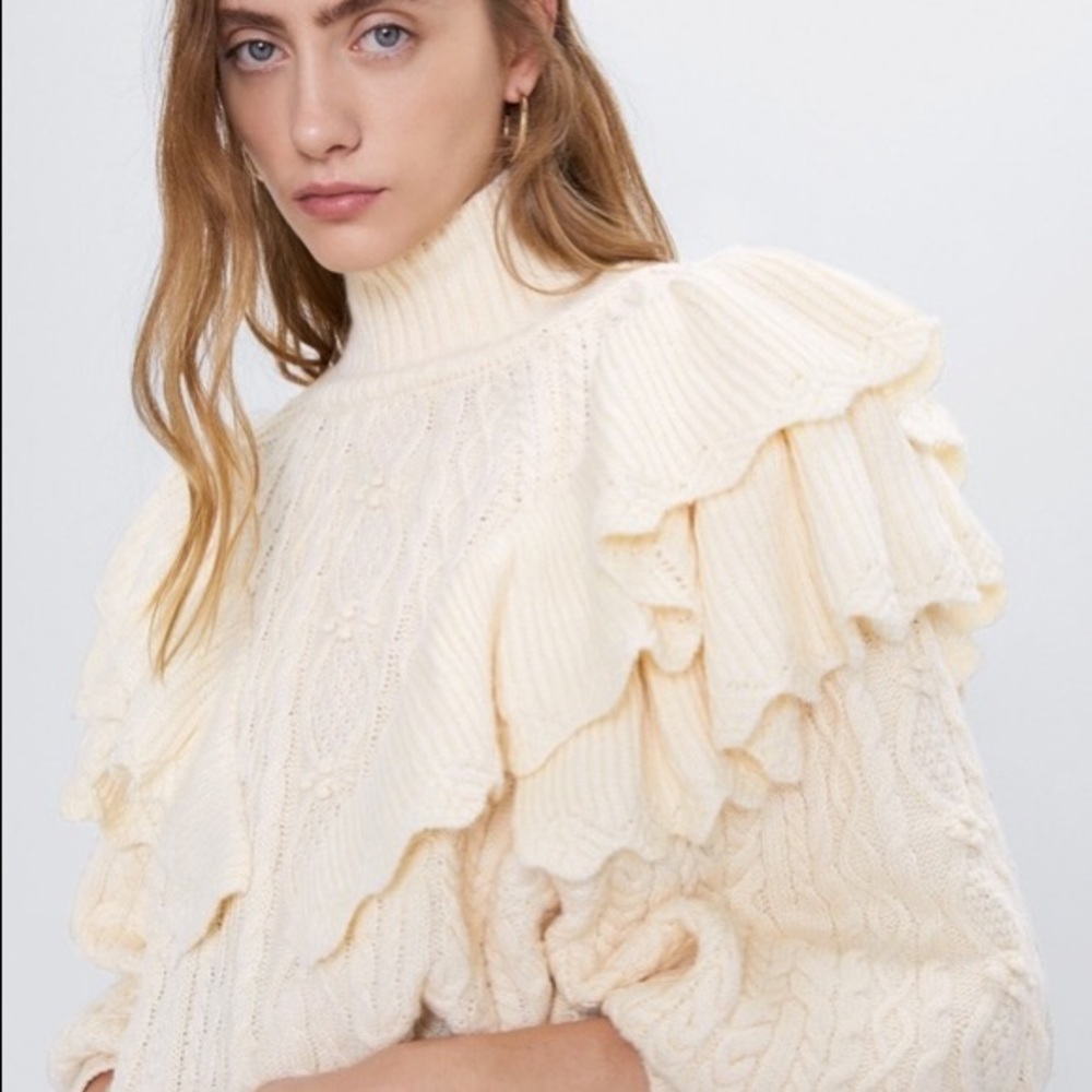 Ruffled cable knit sweater